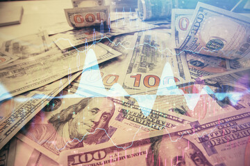 Multi exposure of forex chart drawing over us dollars bill background. Concept of financial success markets.