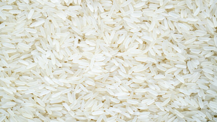 Basmati rice as background. Jasmine rice detail texture background, close up shot of the rice background