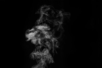 Smoke fragments on a black background. Abstract background, design element, for overlay on pictures