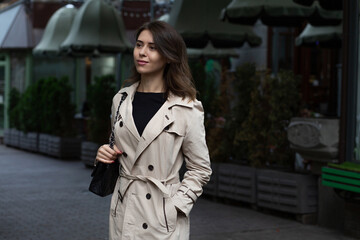 Street shot: stylish elegant woman wears coat