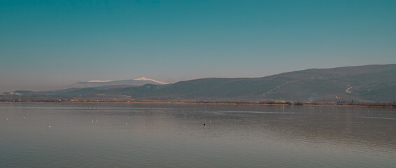 Obraz premium Panoramic view of the beautiful Lake Ulubat seen from Gölyazi in the Bursa Province, Turkey
