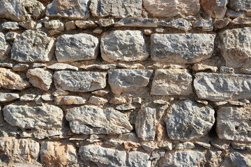 Texture of old stone wall surface background.