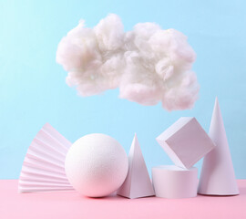 Minimalistic composition of geometric shapes and fluffy cloud on a blue pink pastel background. Minimalism background. Concept art