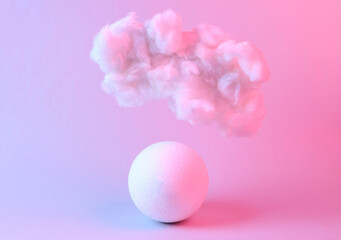 Floating fluffy cloud with ball in blue pink neon gradient light. Creative idea. Creative art. Minimalism