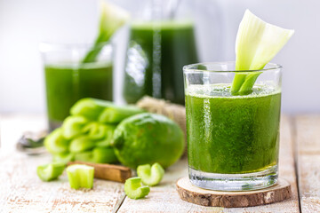 celery juice, lemon, cabbage and mint and cinnamon, healthy vegetarian sugar-free vegetable drink for diet and detox