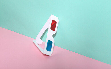 3D glasses on blue-pink background. Minimalism. Creative layout.