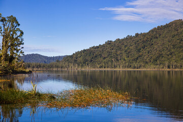 Fototapeta na wymiar Scenic view of Lake Mahinapua in New Zealnad