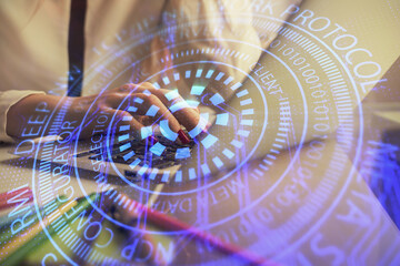 Multi exposure of woman hands working on computer and data theme hologram drawing. Tech concept.