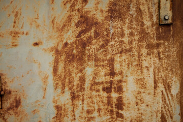 Rusty old metal texture with remnants of the paint. Grungy background for any design. 