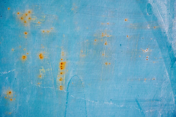 Rusty old metal texture with remnants of the paint. Grungy background for any design. 