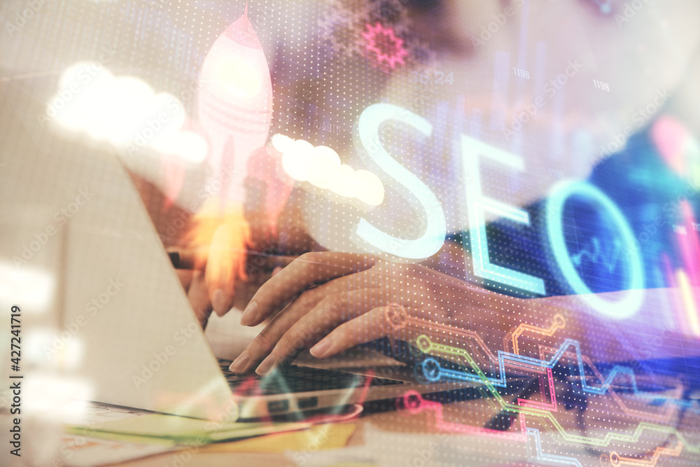 Poster double exposure of woman hands working on computer and seo hologram drawing. internet search concept