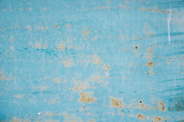 Rusty old metal texture with remnants of the paint. Grungy background for any design. 