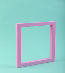 Pink frame on a blue background. Minimalism. Pastel color trend