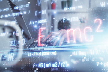 Double exposure of woman hands typing on computer and formula hologram drawing. Education concept.