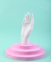 Hand stand on Pink. Abstract composition in minimal design.
