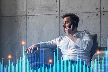 Good looking man in casual wears, talking phone. Double exposure. The concept of financial market. Statistics graph hologram.