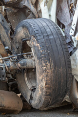 Close-up of the old tires of the car wheels were demolished.