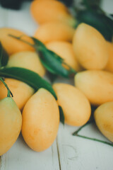 Bunch of Sweet yellow Mayongchid. Seasonal fruit in Thailand for February-April