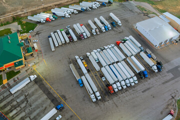 Aerial view of parking lot with trucks on transportation of truck rest area dock © ungvar