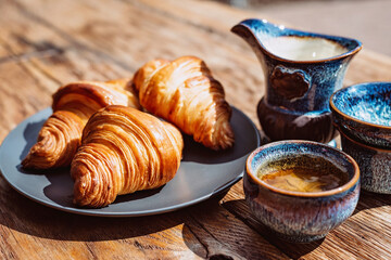Breakfast with Chinese tea and fresh pastries, aromatic butter croissants. Tea ceremony.