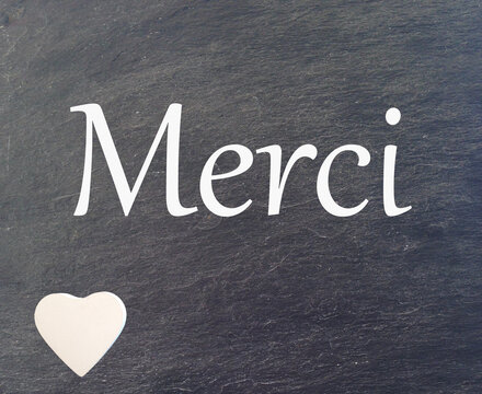 merci sur ardoise , et coeur blanc