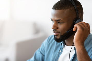 Closeup Portrait Of Young Handsome African American Man In Headset