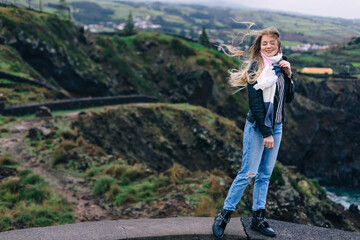 Naklejka premium Traveler Woman traveler enjoying and walking on the road in rainforest, summer vacation.