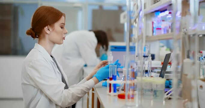 Scientist female doctor making medical research in hospital laboratory