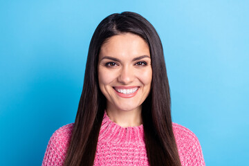 Fototapeta premium Photo of friendly satisfied person toothy smile look camera wear sweater isolated on blue color background
