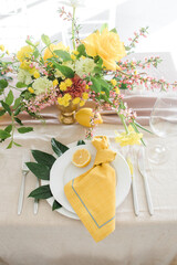 serving on a lemon-colored table with a yellow napkin
