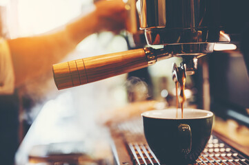barista person making coffee in cafe, hot drink cup from espresso machine, beverage restaurant business, vintage filter image