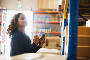 worker using bar code scanner in industry warehouse, logistic technology business to delivery...