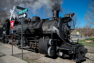 Obraz na płótnie Canvas steam train in the mountains