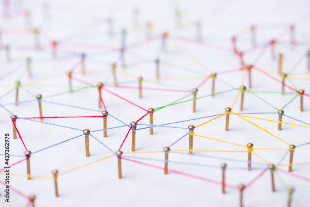 Aufkleber abstract web line connection of color yarn from nail node to node on white background , networking concept