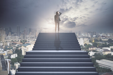 Fototapeta na wymiar Businesswoman standing at the top of the concrete stairway thinking above the town. Future success and growth concept