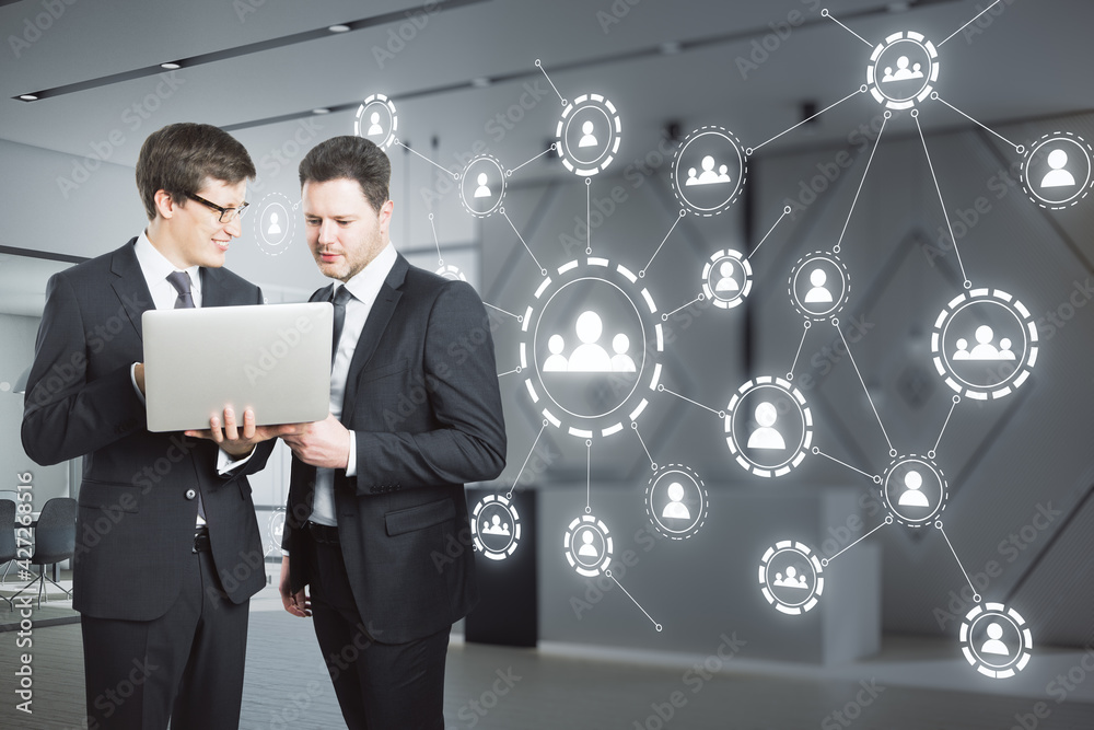 Aufkleber successful remote work process concept with discussing businessmen with laptop on digital wall backg