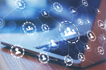 Social network concept with digital application media icons connected by lines on opened laptop background