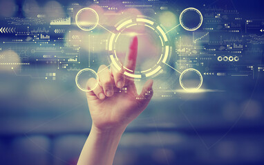 Tech circle with a hand pressing a button