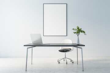 Blank white poster in black frame on light wall behind stylish work space with marble table, modern laptop and concrete floor, 3D rendering, mock up