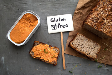 Gluten-free bread sandwiches with fish pate. Gray background, top view.