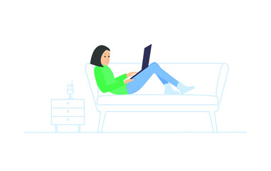 freelancer works while lying on the couch in a laptop