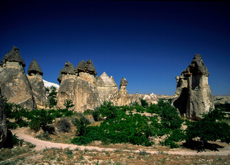 Zelve, Cappadocia, Turkey, 06.15.2018: rock and lava formations shaped by wind and rain erosion