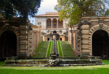Caprarola, Farnese palace, Italy, 11/12/2013: The garden (park) of the villa Farnese with the Casina del pleasure, a small summerhouse surrounded by statues and fountains.