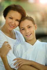 Beautiful mother with son in  park