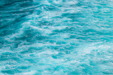 Abstract sea background. The surface of the blue, turquoise ocean.
