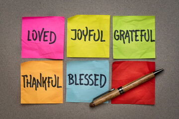 loved, joyful, grateful, thankful, blessed - inspirational and spiritual words on sticky notes,...