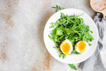 fresh salad egg lettuce leaves mix arugula, chard healthy meal copy space food background. top view diet vegan or vegetarian food