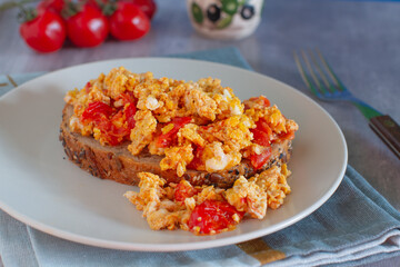 Scrambled eggs on a toast 