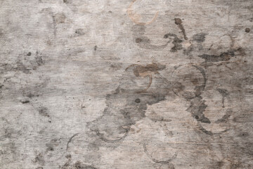 The texture of a wooden table with spots. Grey wood and round stains from drinks glasses. Texture...