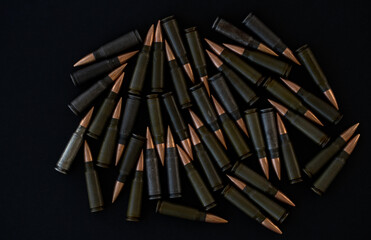 Cartridges for AKM 7.62x39 on a black background